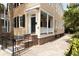 Home exterior showing brick foundation and front porch at 8 Pitt St # A, Charleston, SC 29401