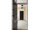Welcoming front porch with a black door, offering a glimpse into the home's inviting interior at 8 Pitt St # A, Charleston, SC 29401