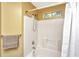 Cozy bathroom showcasing a shower/tub combo with white tile and updated fixtures at 8507 William Moultrie Dr, North Charleston, SC 29420