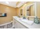 Elegant double sink bathroom with modern fixtures, decorative accents, and bright lighting at 8507 William Moultrie Dr, North Charleston, SC 29420