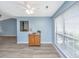 Sun-drenched breakfast nook with generous windows and stylish flooring, adjacent to the kitchen at 8507 William Moultrie Dr, North Charleston, SC 29420