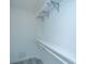Walk in closet featuring neutral colors and shelving for organization at 8507 William Moultrie Dr, North Charleston, SC 29420