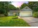 Charming single story home with light blue siding, manicured lawn and a two car garage at 8507 William Moultrie Dr, North Charleston, SC 29420