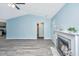 Comfortable living space showcases a cozy fireplace and modern flooring for relaxation at 8507 William Moultrie Dr, North Charleston, SC 29420