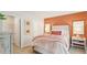Serene bedroom with warm accents, soft lighting, and a cozy atmosphere for relaxation at 8840 Shovelnose Ct, North Charleston, SC 29406