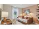 Stylish secondary bedroom provides versatile space for guest or home office at 8840 Shovelnose Ct, North Charleston, SC 29406
