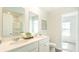 Bright bathroom featuring double sinks, a neutral color scheme, and a spacious layout at 8854 Shovelnose Ct, North Charleston, SC 29406