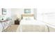 Cozy bedroom featuring natural light, neutral walls, and a comfortable bed at 8854 Shovelnose Ct, North Charleston, SC 29406