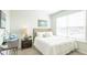 Cozy bedroom featuring natural light, neutral walls, and a comfortable bed at 8854 Shovelnose Ct, North Charleston, SC 29406