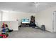 Large bonus room showcasing a ceiling fan, a TV area, and plenty of space for activities at 8921 Skipping Rock Ln, Summerville, SC 29485