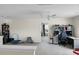 Spacious bonus room featuring a ceiling fan and an open floor plan leading to another room at 8921 Skipping Rock Ln, Summerville, SC 29485