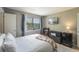 Comfortable bedroom with view, featuring light-colored walls, wood flooring, and modern appliances at 925 Dills Bluff Rd # 34, Charleston, SC 29412