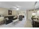 The living room features a ceiling fan, cozy seating, neutral decor, and tile floors at 925 Dills Bluff Rd # 34, Charleston, SC 29412
