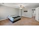 Neutral-colored bedroom featuring carpet, ceiling fan, and decor on the wall at 9313 Sweetbay Ct, Ladson, SC 29456