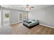 Spacious bedroom featuring neutral walls, ceiling fan, and access to a balcony or deck at 9313 Sweetbay Ct, Ladson, SC 29456