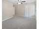 Bright bedroom with ceiling fan, carpet and two entry doors at 932 Portabella Ln, Charleston, SC 29412
