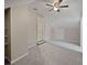 Spacious carpeted bedroom with ceiling fan, dormer roof, and doorway at 932 Portabella Ln, Charleston, SC 29412