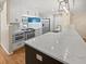 Modern kitchen featuring stainless steel appliances, a large island and white cabinetry at 932 Portabella Ln, Charleston, SC 29412