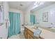 This bathroom features a shower with curtain, a sink and cabinet at 100 Cicero Ct, Goose Creek, SC 29445