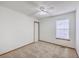 This bedroom features a ceiling fan and large window at 100 Cicero Ct, Goose Creek, SC 29445