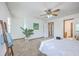 Bedroom includes a ceiling fan, large windows, and stylish decor at 100 Cicero Ct, Goose Creek, SC 29445
