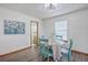 Cozy dining area with a round table, charming chairs, and hardwood floors at 100 Cicero Ct, Goose Creek, SC 29445