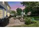 Beautiful backyard with an inviting fire pit, grill, and patio seating at 100 Conset Bay Ct, Goose Creek, SC 29445
