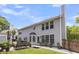 Backyard with a patio seating area and views of the home's architecture at 100 Conset Bay Ct, Goose Creek, SC 29445