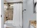 Bathroom with bathtub, tiled shower with curtain, neutral decor, and granite countertops at 100 Conset Bay Ct, Goose Creek, SC 29445