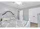 Bright bedroom featuring neutral walls, carpet, a ceiling fan, and a double-door closet at 100 Conset Bay Ct, Goose Creek, SC 29445
