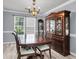 Formal dining room with hardwood floors, large wooden table, and chandelier lighting at 100 Conset Bay Ct, Goose Creek, SC 29445