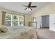 Spacious main bedroom with vaulted ceiling, carpet, and a large window for plenty of natural light at 100 Conset Bay Ct, Goose Creek, SC 29445
