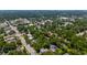 Aerial shot of the residential neighborhood showcasing tree-lined streets, lush greenery, and charming homes at 100 S Gum St, Summerville, SC 29483