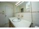 Traditional bathroom featuring a vanity, commode, and bathtub with a shower, and neutral-toned tile at 100 S Gum St, Summerville, SC 29483