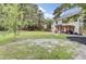 Expansive backyard with patio and pergola, perfect for outdoor living and entertaining at 103 Trimley Ct, Goose Creek, SC 29445