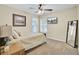 Comfortable bedroom featuring natural light, plush carpet, and a calming atmosphere at 103 Trimley Ct, Goose Creek, SC 29445