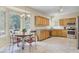 Spacious kitchen with wooden cabinets, stainless steel appliances, and an eat-in area perfect for casual dining at 103 Trimley Ct, Goose Creek, SC 29445