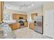 Bright kitchen featuring stainless steel appliances, granite countertops, and light wood cabinetry at 103 Trimley Ct, Goose Creek, SC 29445