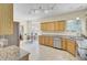 Spacious kitchen with stainless steel appliances, granite counters, and breakfast nook at 103 Trimley Ct, Goose Creek, SC 29445