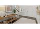 Bright foyer with hardwood floors, a decorative console table, and a white front door at 106 Lefton Lndg, Summerville, SC 29485