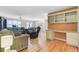 Inviting living room with hardwood floors, neutral paint, built-ins, and lots of natural light at 1102 N Shadow Dr, Mount Pleasant, SC 29464