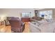 Inviting living room with wood floors, neutral paint, lots of natural light, and plush furniture at 1102 N Shadow Dr, Mount Pleasant, SC 29464
