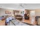 Spacious living area with hardwood floors, open layout, lots of seating, and views of kitchen at 1102 N Shadow Dr, Mount Pleasant, SC 29464