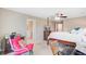 Spacious main bedroom with en suite bathroom and a four poster bed at 1102 N Shadow Dr, Mount Pleasant, SC 29464