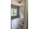 Bedroom featuring natural light from the windows and wood-look flooring at 110A Dukes St, Saint George, SC 29477