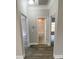 Hallway that leads to the bedrooms and bathrooms at 110A Dukes St, Saint George, SC 29477