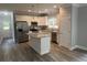 Beautiful kitchen featuring an island, stainless steel appliances, and ample counter space at 110A Dukes St, Saint George, SC 29477