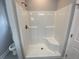 Modern shower with sleek fixtures and a built-in seat at 110A Dukes St, Saint George, SC 29477