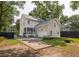 Home's backyard features a patio, ample parking, lawn and privacy fence at 1116 Sea Island Crossing Ln, Mount Pleasant, SC 29464