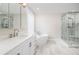 Elegant bathroom boasts double vanity, soaking tub, and tiled walk-in shower at 1116 Sea Island Crossing Ln, Mount Pleasant, SC 29464